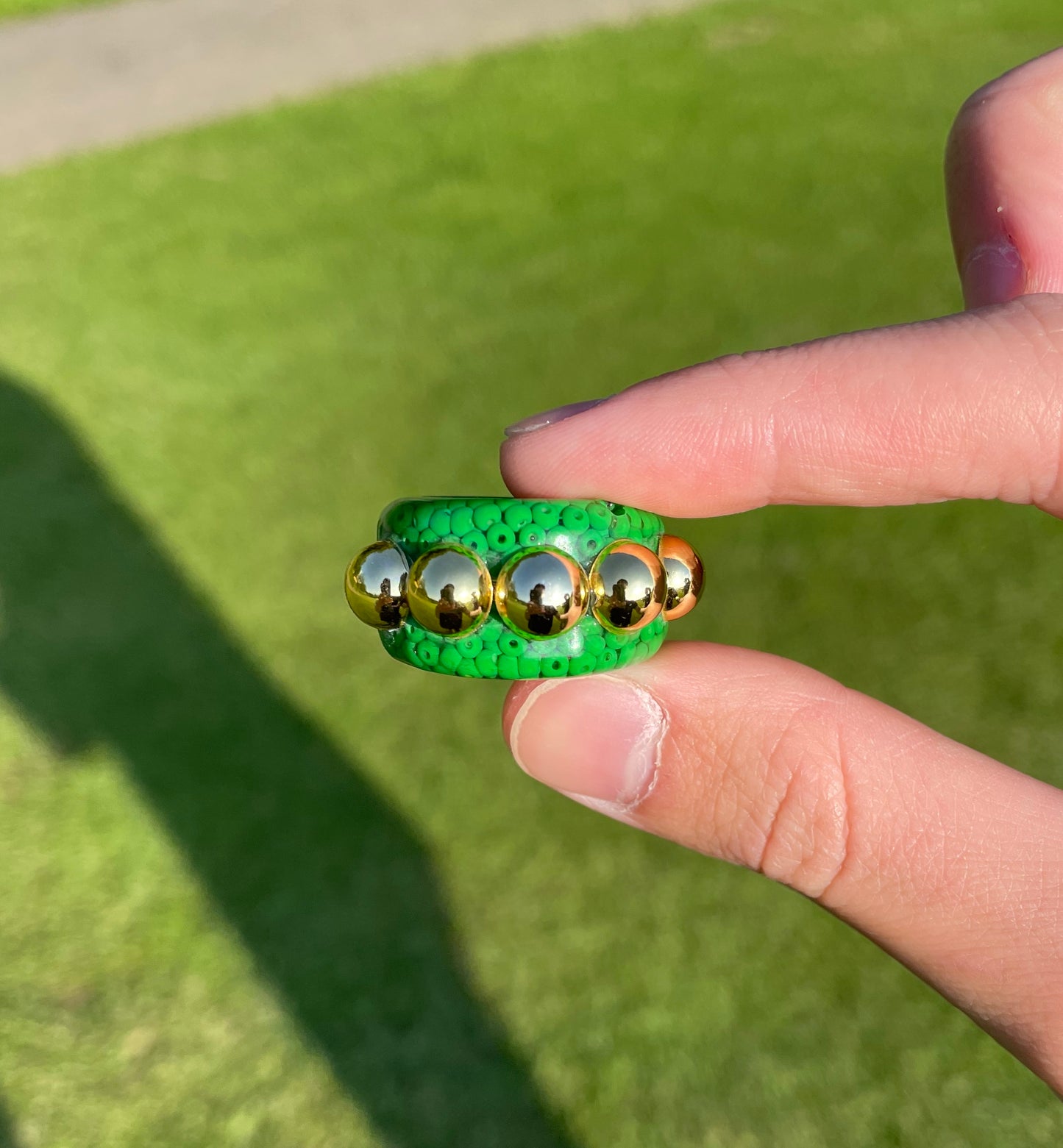 Green dotted gold bead ring